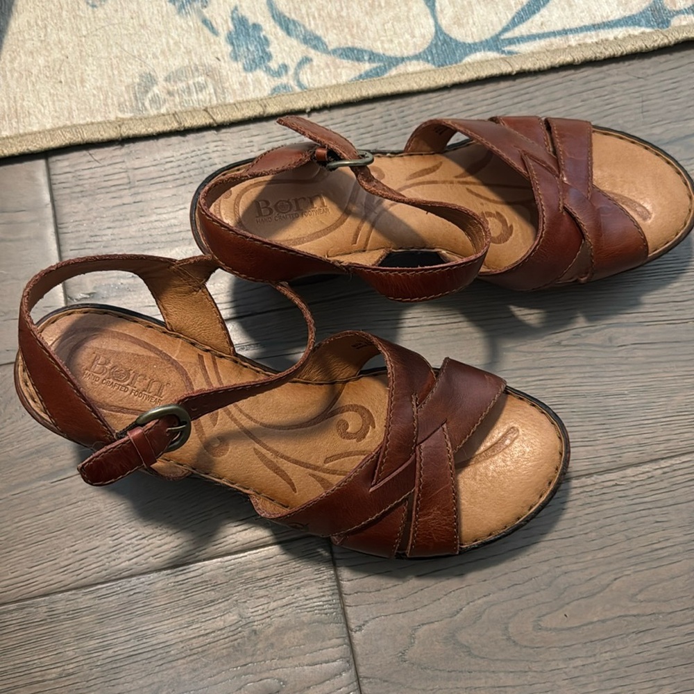 These sandals are very comfortable and have a 2 1/2 inch heel and are leather.